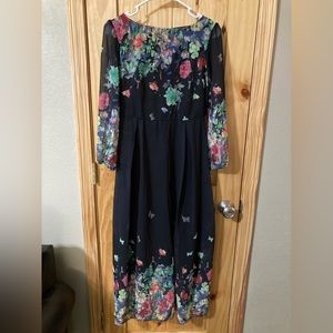 Beautiful black and floral unbranded dress with long sleeves